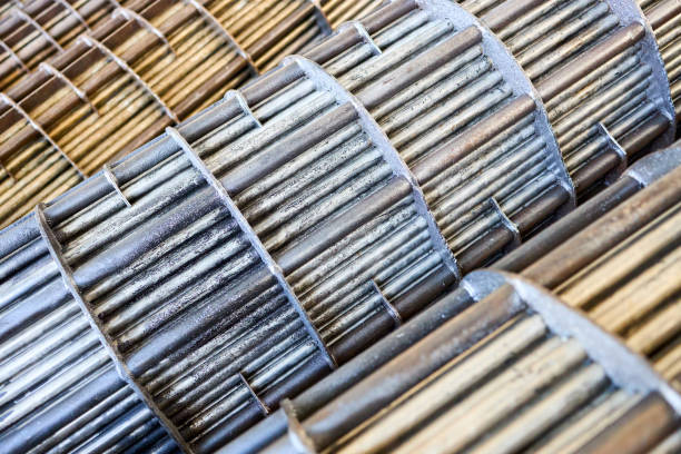 Heat exchangers tube bundle details of industrial heat exchanger shell and tube condenser, made of steel with corrosion. Abstract industrial background of carbon steel heat exchanger, tube bundles. intercambiadores de calor detalles del haz de tubos de la carcasa del intercambiador de calor industrial y el condensador de tubos, hecho de acero con corrosión. fondo industrial abstracto de los haces de tubos intercambiadores de calor de acero al carbon
