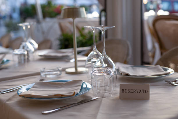 Vacant table waiting for guests who have reserved at the restaurant