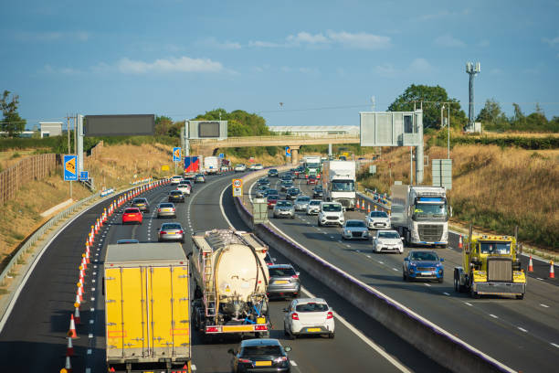 istock heavy traffic in blurry motion on UK motorway in England 1433398151