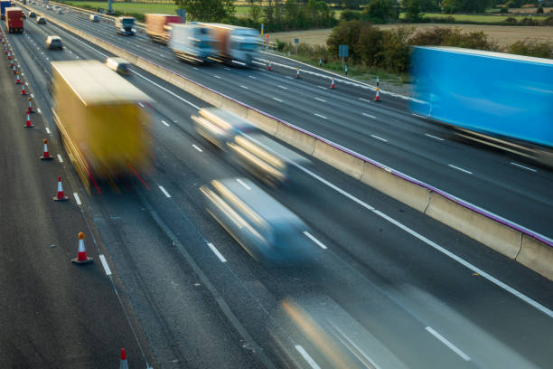 istock heavy traffic in blurry motion on UK motorway in England 1433398215