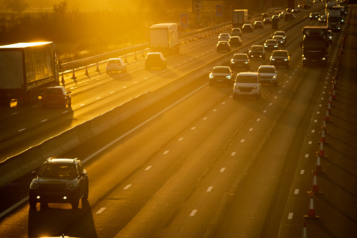 heavy traffic in blurry motion on UK motorway in England.