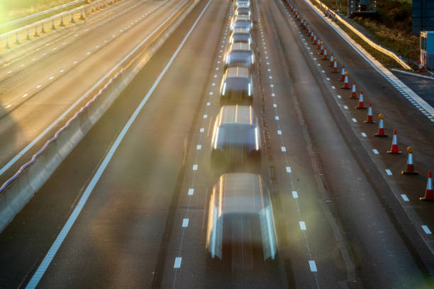 istock heavy traffic in blurry motion on UK motorway in England 1433398228