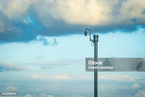 Sunny Day View Of Uk Motorway Traffic With Cctv Camera On Foreground Stock Photo - Download Image Now