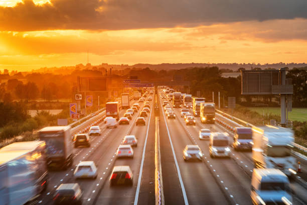istock heavy traffic in blurry motion on UK motorway in England 1433398242