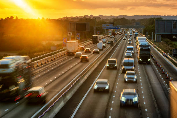 istock heavy traffic in blurry motion on UK motorway in England 1433398252