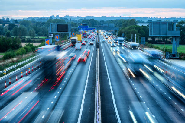 istock heavy traffic in blurry motion on UK motorway in England 1433398253