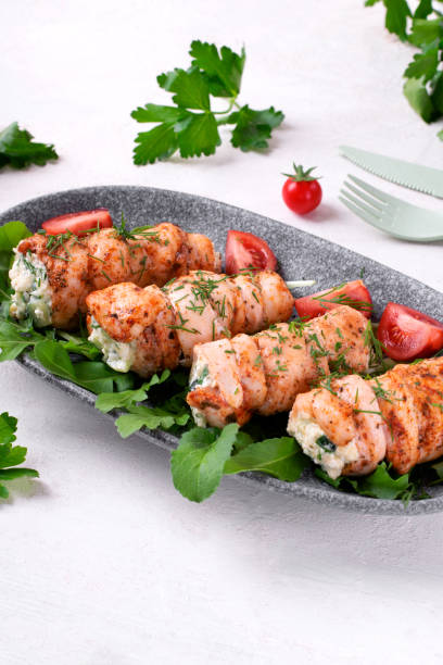 istock Chicken rolls stuffed with lettuce, egg, cheese, cucumber and sour cream 1433398582
