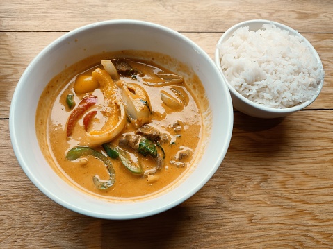 Delicious Thai curry coconut milk  and steamed rice dish at glasgow scotland england uk