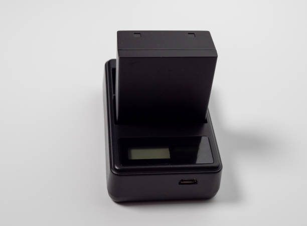 istock Battery for the camera on a white background. 1433399810