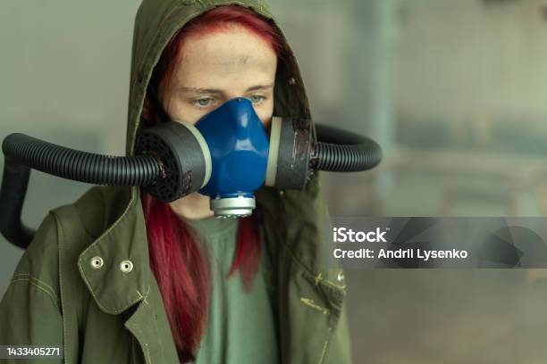 Post Apocalypse Female Survivor In Oxygen Mask Stock Photo - Download Image Now - Apocalypse, Match - Sport, Nuclear Fallout