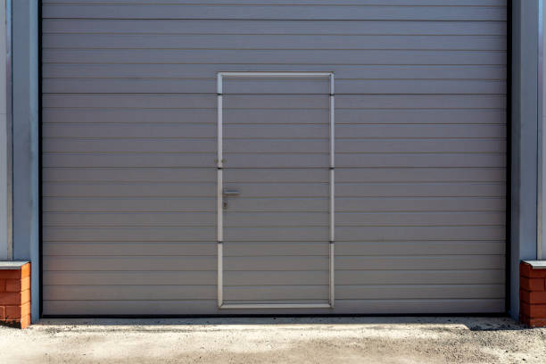 istock Doors in the lifting mechanism in the warehouse 1433408190
