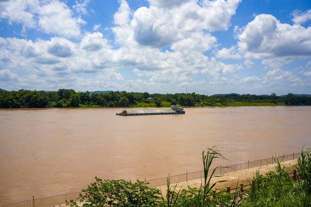 istock Large sand mining boat driving on the river outdoors 1433409551