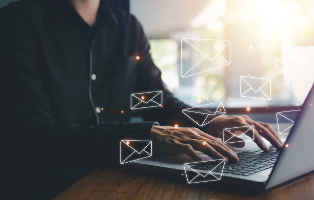 istock Businessman hand typing notebook (Laptop) with email icon and send e-mail or news letter. Electronicmail marketing and online working internet network concept. 1433411098