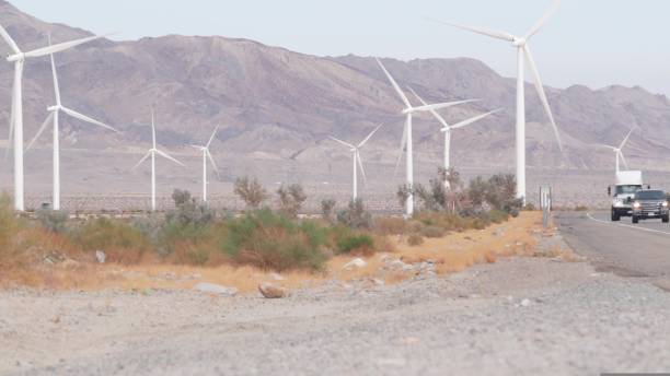 istock Windmills on wind farm, wind mill energy generators. Desert windfarm, USA. 1433414405