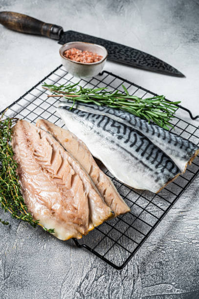 istock Fresh sliced mackerel fillet fish. White background. Top view 1433414665