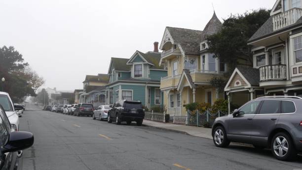 Old victorian style houses, historic Monterey, California. Colonial architecture Row of old victorian style houses, historic residential district, Monterey, California USA. Colonial architecture, retro vintage suburban wooden classical cottages. Real estate property, city street. city of monterey california stock pictures, royalty-free photos & images