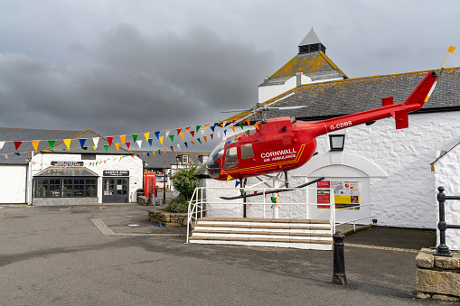 Land's End, United Kingdom - 3 September, 2022: the helicopter of the Cornwall Air Ambulance exhibit in the Land's End tourist complex in Cornwall
