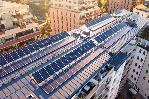 Solar panels on the roof of an apartment building in a residential district in Stockholm.