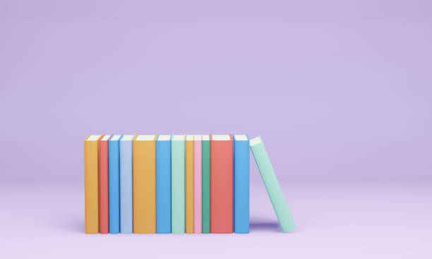 istock Group of colourful books on purple background 1433429041