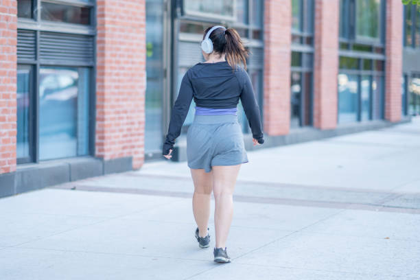 istock Woman Taking a Walk Through the City 1433429245