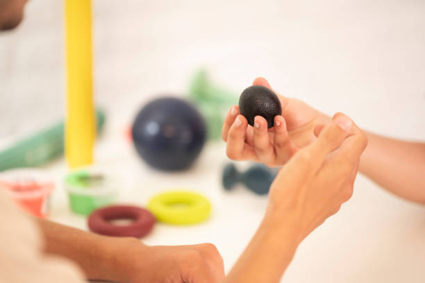 istock Female physiotherapist is examining to her patient. 1433429320