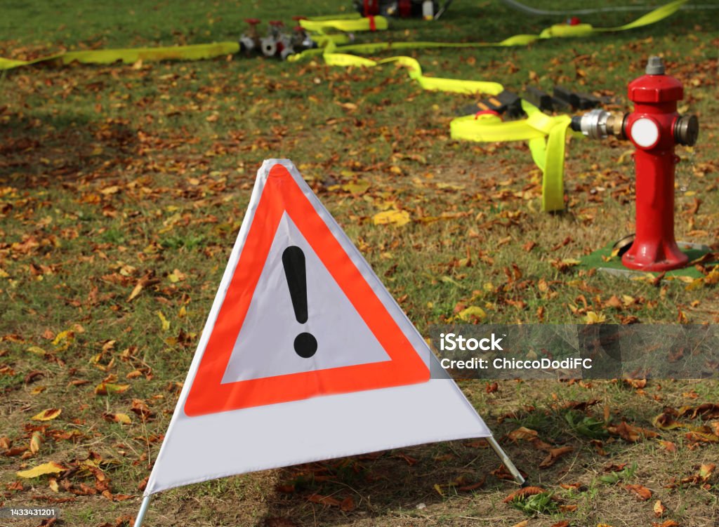 Triangular Fire Hydrant Sign Triangle With Exclamation Mark And A Red Fire Hydrant Stock Photo ...