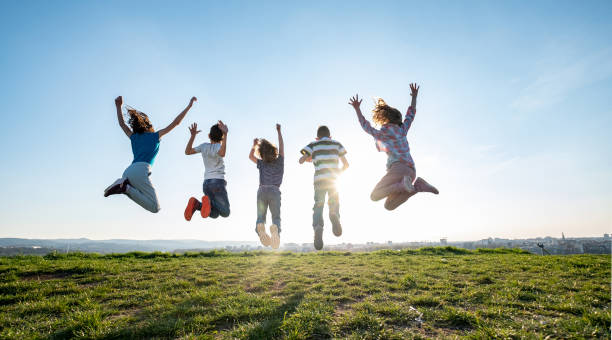 istock teenagers jump 1433435312