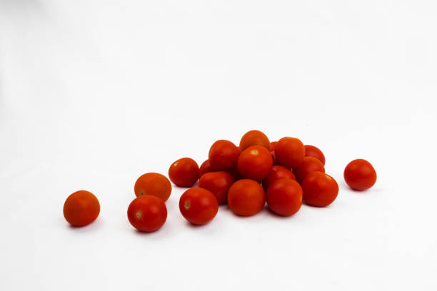 Cherry tomatoes on white background stock photo