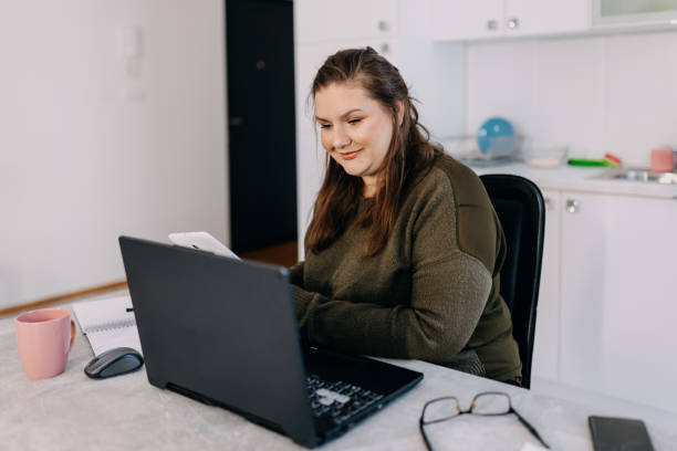 istock Woman freelancing at home 1433445123