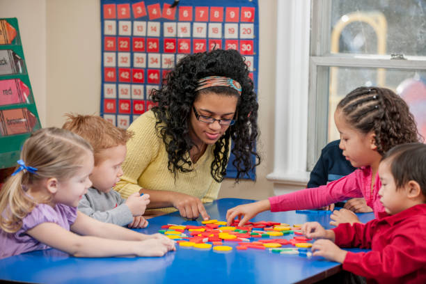 istock Daycare Children Working Together 1433447197