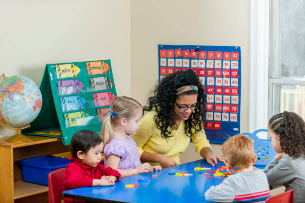istock Daycare Children Working Together 1433447198