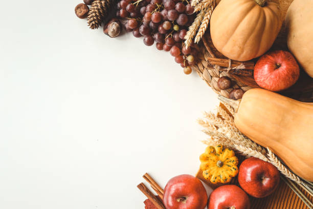 istock Pumpkins and colorful autumn decorations on white background. 1433449787