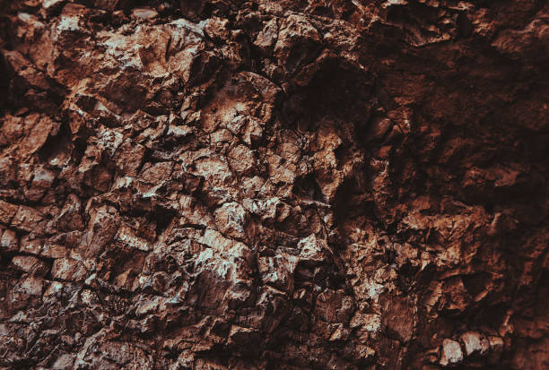 istock Brown texture. Stone background. Rock texture. Grunge Rough structure. Abstract texture. Rock surface with cracks. Rock pile. Paint spots wall. Wall marble. 1433456009