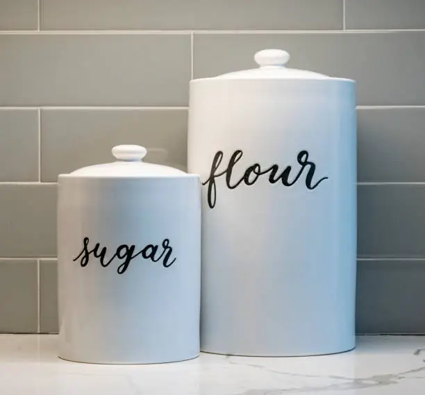 Two jars of sugar and flour
