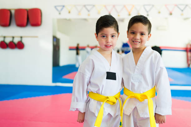 istock Cheerful kids friends at a taekwondo class 1433469954