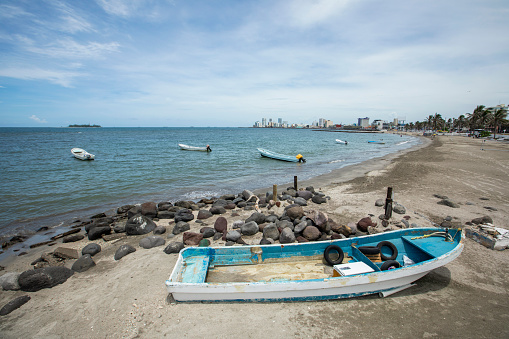 A boat sits on a beach at Boca Del Rio, Veracruz, Mexico.