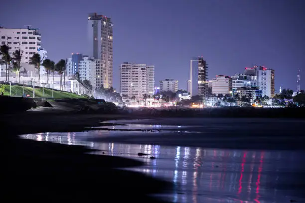 Night time view of the beach front and skyline of Boca Del Rio, Veracruz, Mexico.