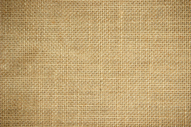 istock Jute hessian sackcloth burlap woven, linen texture pattern background in light beige cream brown color blank. Natural weaving canvas fiber line cotton cloth textured as clean organic for decoration. 1433471210