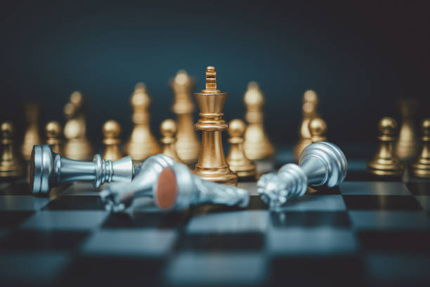 istock Strategy and business planning ideas. Chess gold on the board. 1433472042
