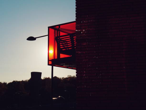 istock Low angle view of red balcony against sun 1433472228