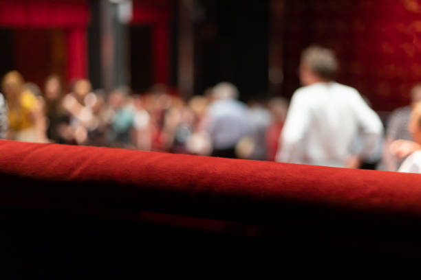 istock people taking seats before theater play 1433478638
