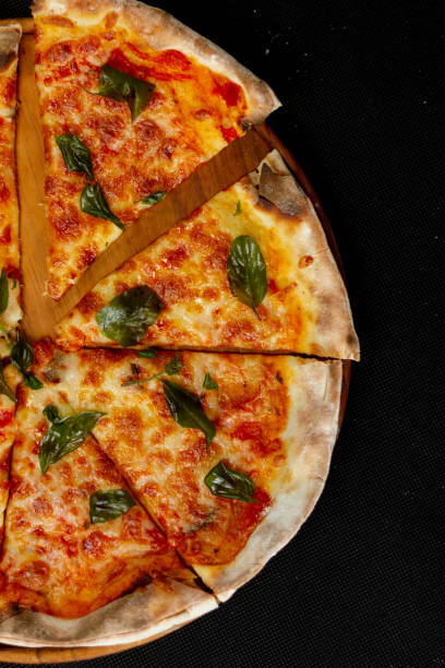 istock Slice of Italian Supreme Pizza 1433485596
