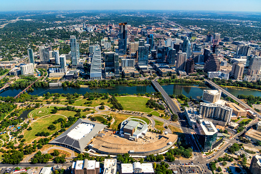 Wide angle aerial view of the skyline of beautiful Austin, Texas and surrounding communities from about 2500 feet in altitude during a helicopter photo flight.