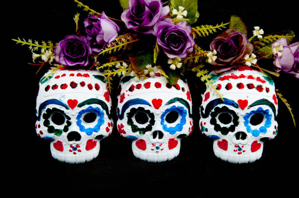 istock Day of the Dead background with skulls 1433497983