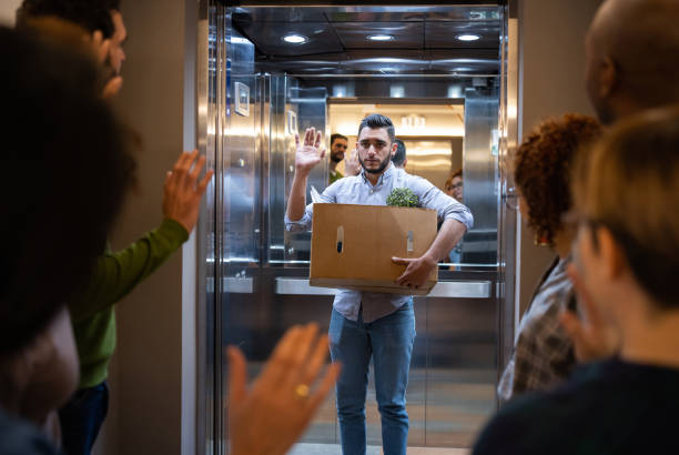 man being fired at his job and leaving the office - firing unemployment downsizing box imagens e fotografias de stock