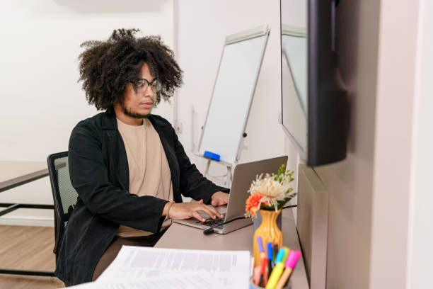 istock Teacher in the classroom preparing content for students 1433505133