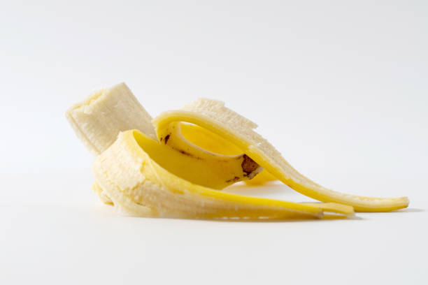 istock half peeled banana open isolated on white 1433507534