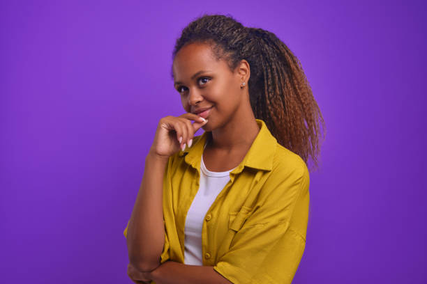 istock Smiling African American woman thinking about future shopping 1433509097