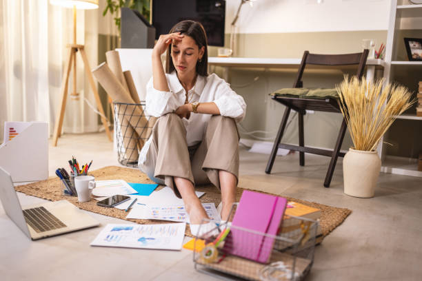 istock Young businesswoman looking stressed while working at home office 1433513751