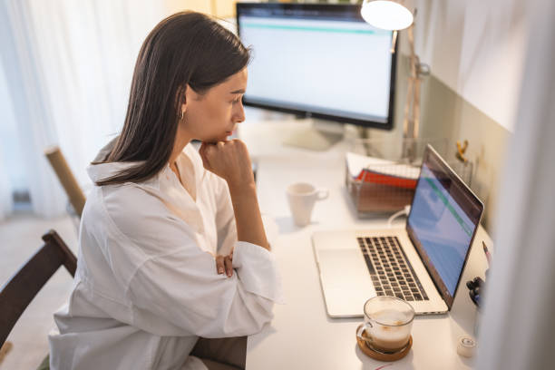 istock Young woman working laptop at home office 1433514919